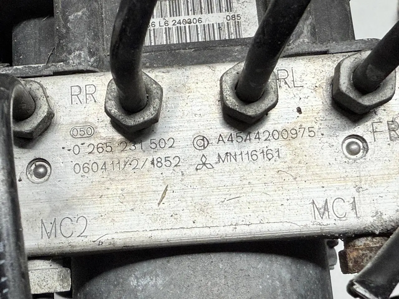 ABS Block Steuergerät Bremsaggregat Mitsubishi Colt 2006 1,3 MN116161