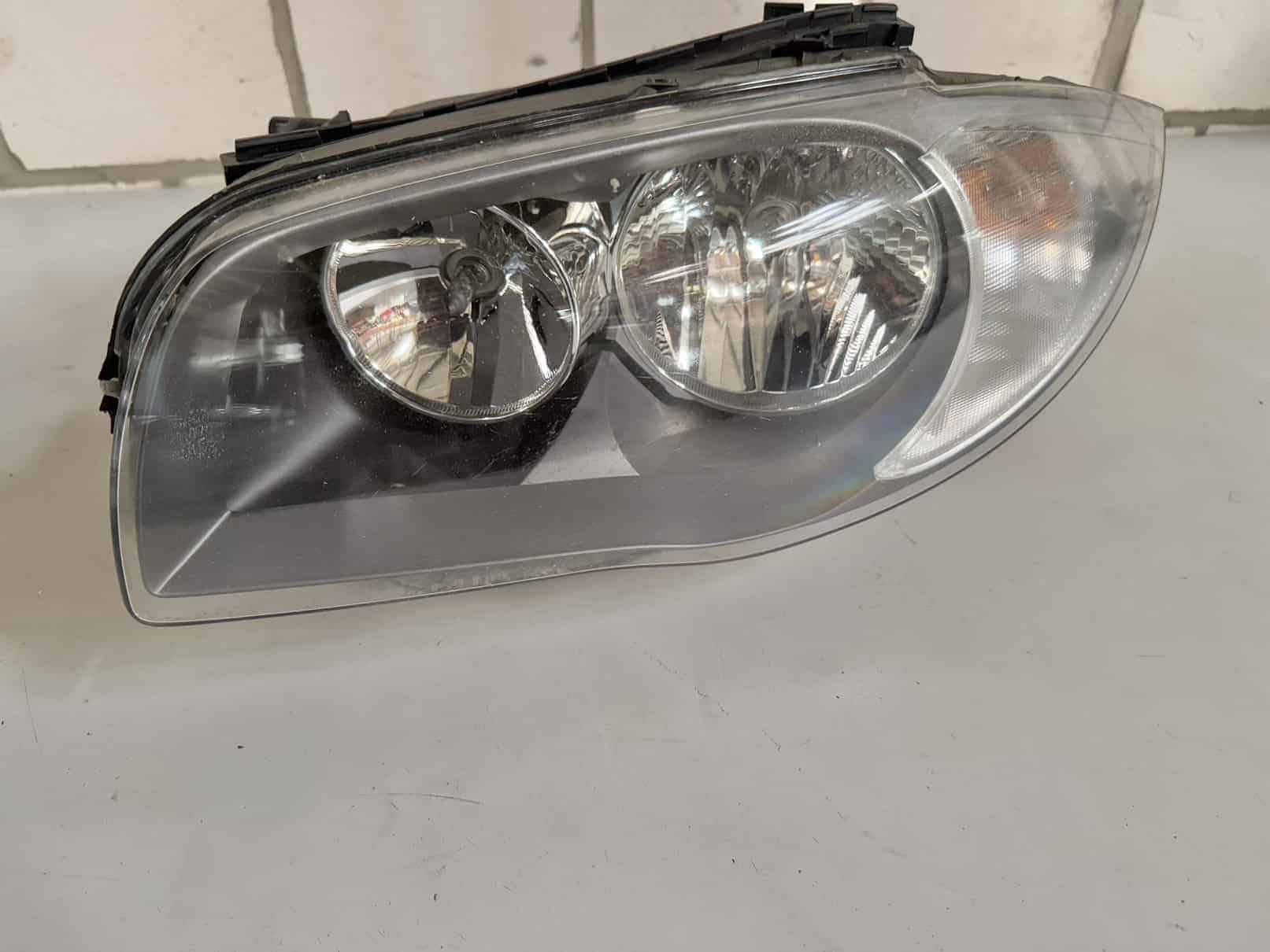 Scheinwerfer links BMW 116i E81 E87 2011 724964902, 69244939, 89502128